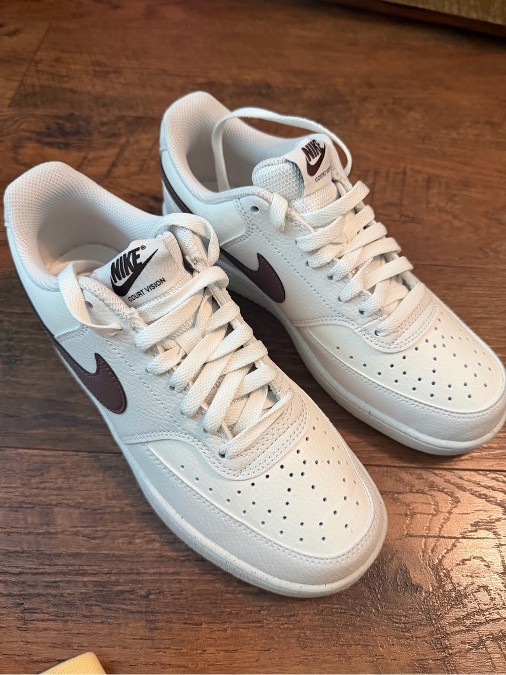 Nike Men’s Court Vision Low light purple with plum swoosh.